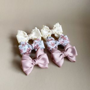 Бантики из разных лент на резинках