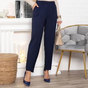 Брюки тёмно-синие на резинке от бренда LT Collection, плавно зауженные к низу от бедра, с ассиметричным низом подойдут как для офисного стиля, так и для повседневных прогулок. Выполнены из костюмной ткани. Изделие с карманами, пояс на резинке, по передней половинке брюк по низу застрочены складки. Это ваши брюки на каждый день!