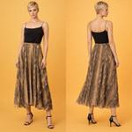 Serpentine Éclat — Шёлковая юбка-миди с питоновым принтом