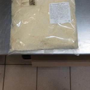 Пармезан тертый сыр из коровьего молока, изготовленный по рецепту Грана Падано.