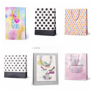 Пакеты бумажные подарочные разных размеров,расцветок