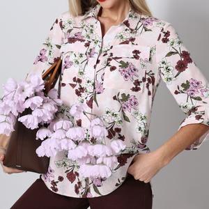 Блузка летняя на пуговицах с карманами от бренда SelenaSonata. Модель прямого силуэта, выполнена из вискозного полотна. Горловина оформлена отложным воротничком на стойке. Рубашка с асимметрией - спинка немного длиннее переда - удобен любой фигуре. Рукава укороченные, собранные патами. Блузка прекрасно будет сочетаться как с юбками, так и с брюками.