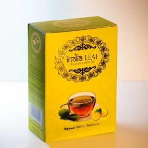 Среднелистовой чёрный чай Ассам, лемонграсс, сушенные кусочки лимона с цедрой.