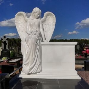 Скульптура ангела на кладбище