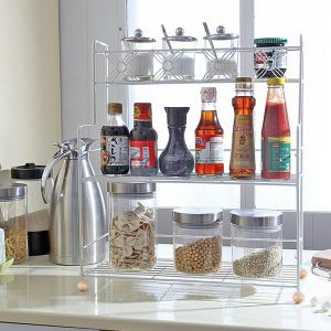 Полка для кухни Use. Компактная полочка разработана для хранения различных бутылок, или других узких предметов. Она выполнена из металлической проволоки и надежно удерживает все вещи на своих местах.