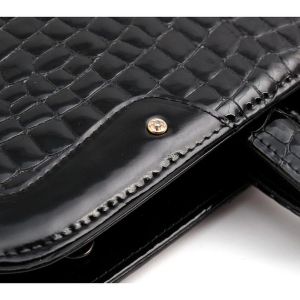 Коллекция Rugena Black. В коллекции Rugena Black классическая чёрная лаковая кожа с тиснением &#34;рептилия&#34; декорирована риветами с кристаллами Swarovski. Классическая коллекция среднего ценового сегмента.