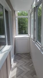 Отделка балконной стены. Низкие цены.