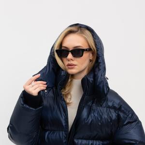 Стильный женский пуховик синего цвета. Теплая и уютная модель, которая подчеркнет ваш образ и обеспечит комфорт в холодное время года. Идеальный выбор для повседневной носки.