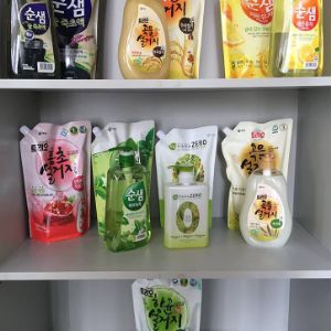 Средства для мытья посуды Корейского производства в бутылках и запасках разных объемов.