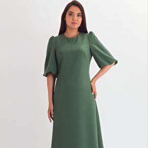 Платье зелёное в деловом стиле от бренда Braslava, выполнено из костюмного полотна. Модель полуприлегающего силуэта с круглым вырезом и объемными рукавами-фонариками стает отличным решением для образа. Изысканность и элегантность, выгодно подчеркнутые достоинства откроют всю вашу женственность!