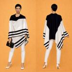 Роскошное монохромное трикотажное пончо