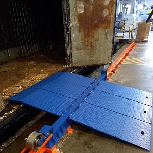 Передвижной перегрузочный мост для железнодорожных вагонов