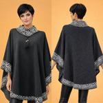 Элегантное пончо в скандинавском стиле с геометрическим декором