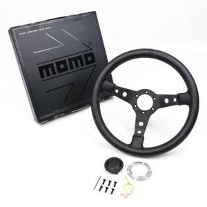 Руль спортивный (без вылета) "MOMO" Prototipo Black Edition (экокожа)
Руль является тем элементом, с которым водитель взаимодействует постоянно, так как именно им осуществляется поворот колёс и, соответственно, управление автомобилем. По этой причине, со временем он покрывается всевозможными потёртостями и теряет презентабельный внешний вид.

Представленный вариант станет отличной заменой для штатного руля.

После установки данный руль отлично впишется в интерьер вашего автомобиля, добавит стильные и спортивные черты.

Размеры:
Длина - 350 мм.
Ширина - 40 мм.
Высота - 345 мм.
Посадочное место - 57 мм.
Отверстия под крепление - 0.6 мм.

*Допускается незначительная погрешность в измерениях вследствие их ручного выполнения.