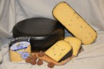 Сыр КУРШАВАЛЬСКИЕ СЫРЫ «КуршавАль» с трюфелем, цилиндр до 5 кг